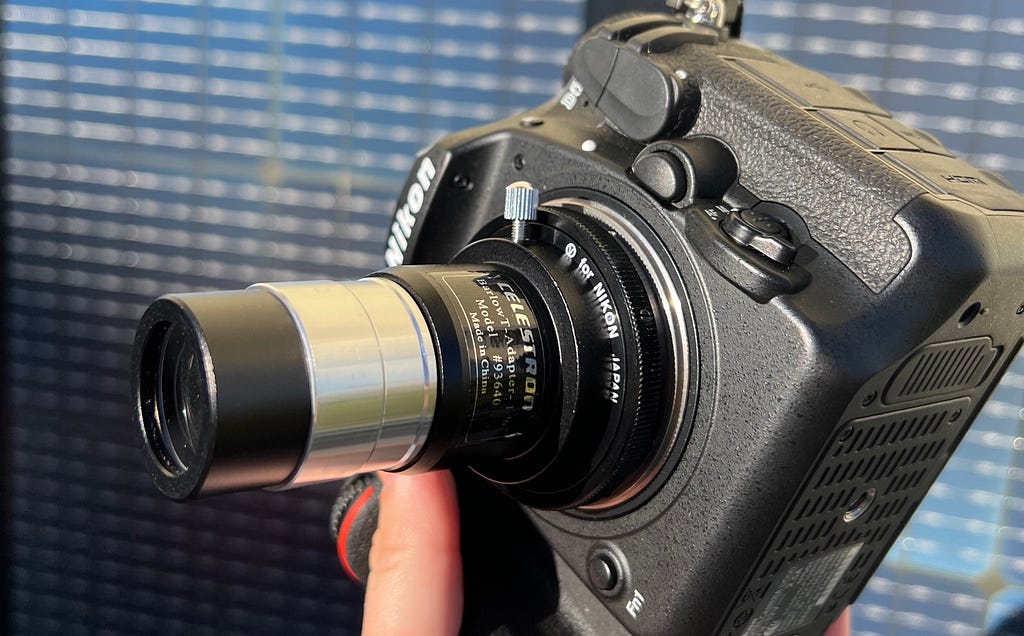 Nikon camera, T-ring and T-adapter screwed together