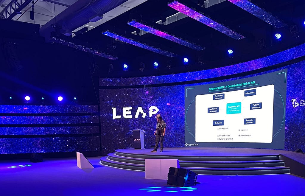 Dr. Ben Goertzel presents the slide “SingularityNET: A Decentralized Path to AGI” at LEAP 2022 conference