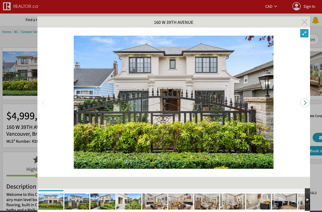 Screenshot from Realtor.ca site showing a mansion for sale. The two-story house has an iron fence and marble columns.