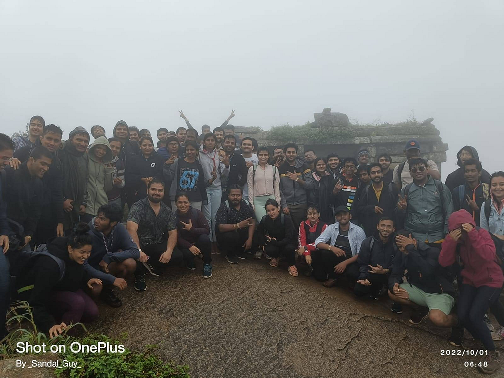 Group photo of the morning sunrise trekkers at Skandagiri.