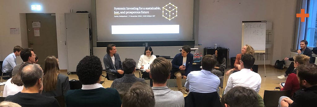 Five people in a panel discussion at a university