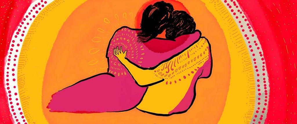 Two figures with their backs to us hold each other, against the backdrop of concentric circles of bright orange and yellow