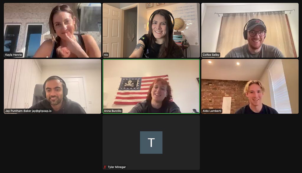 A screenshot from a GitPOAP team meeting via zoom — 7 participants: 4 engineers and 3 everything-else team members. 3 women, 4 men, 6 smiles, 1 non-video participant.