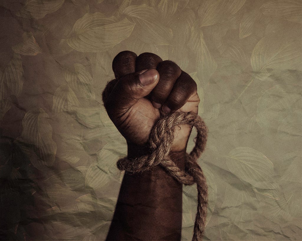 Slavery. Photo by Tasha Jolley on Unsplash