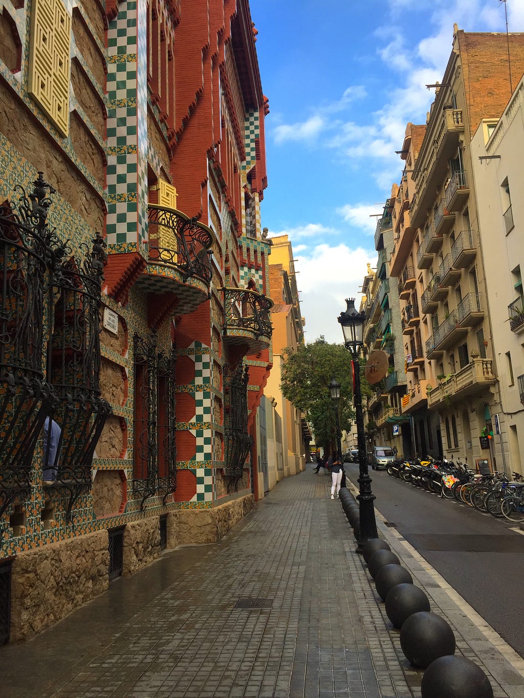 Casa Vicens in Barcelona — a lego-like house covered in red brick, as well as green and white tile.