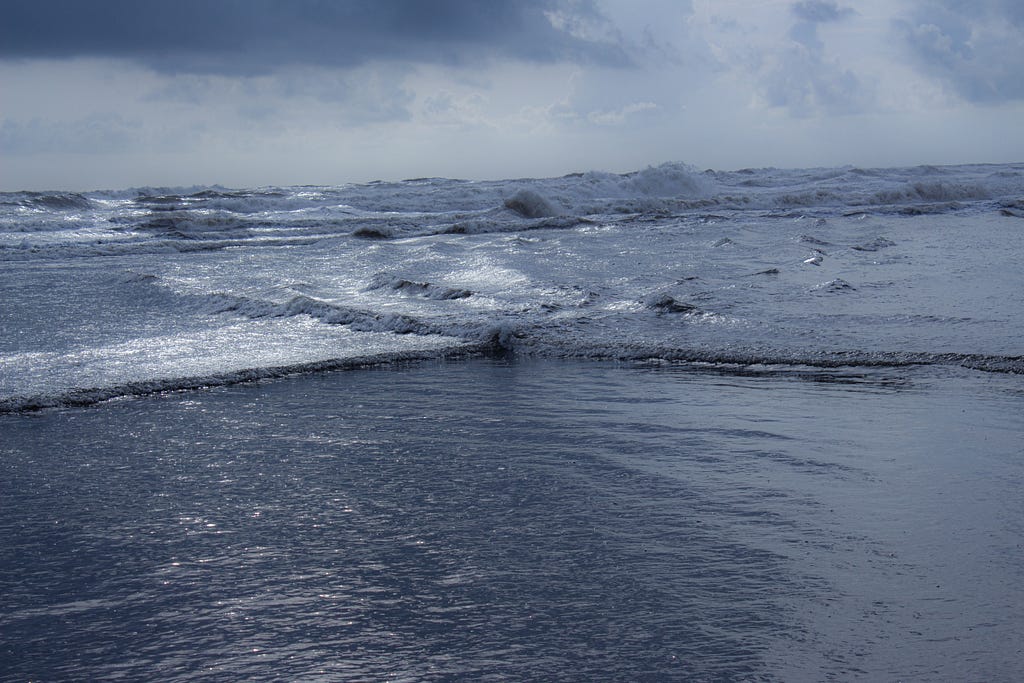 Waves breaking on a beach