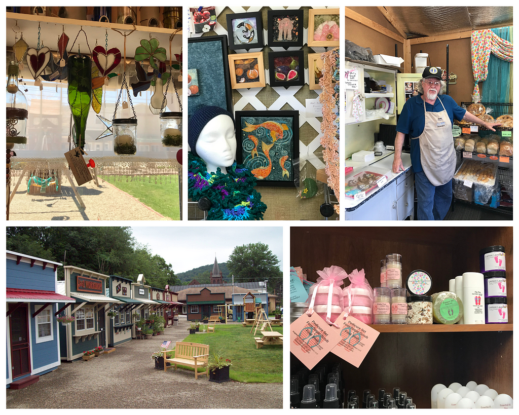 A photo collage shows stained glass sun catchers, framed colorful torn paper artworks, a man standing with a rack of baked goods, handmade cosmetics and lotions, and an exterior of the market village sheds in a row.