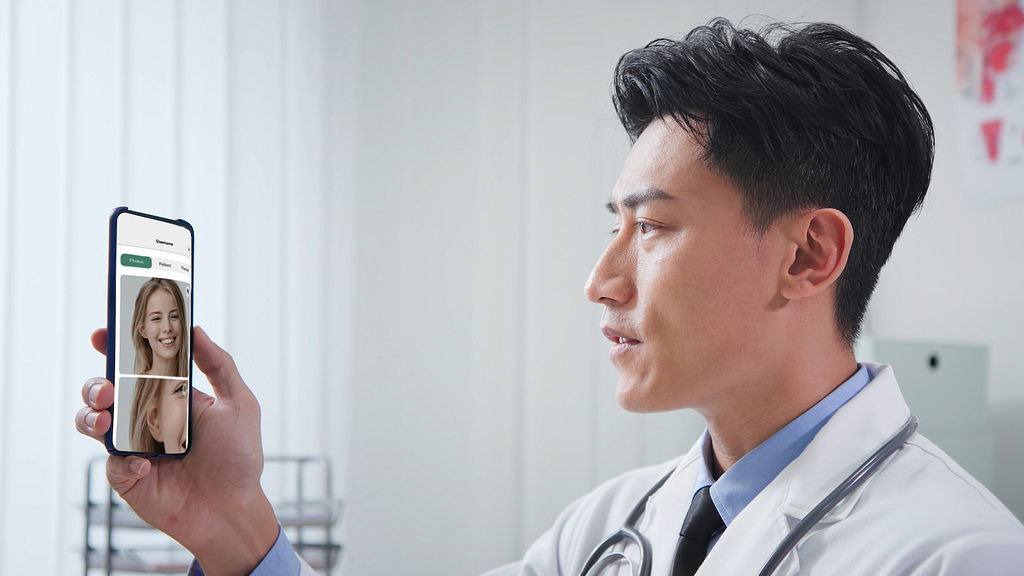 A doctor looking at a user’s photos