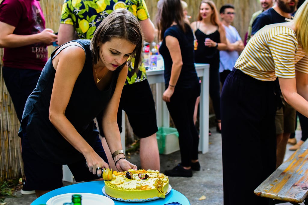 Wolfpack Digital CEO, Gina Lupu sharing her Birthday Cake she got from Wolfpack Digital team, team spirit