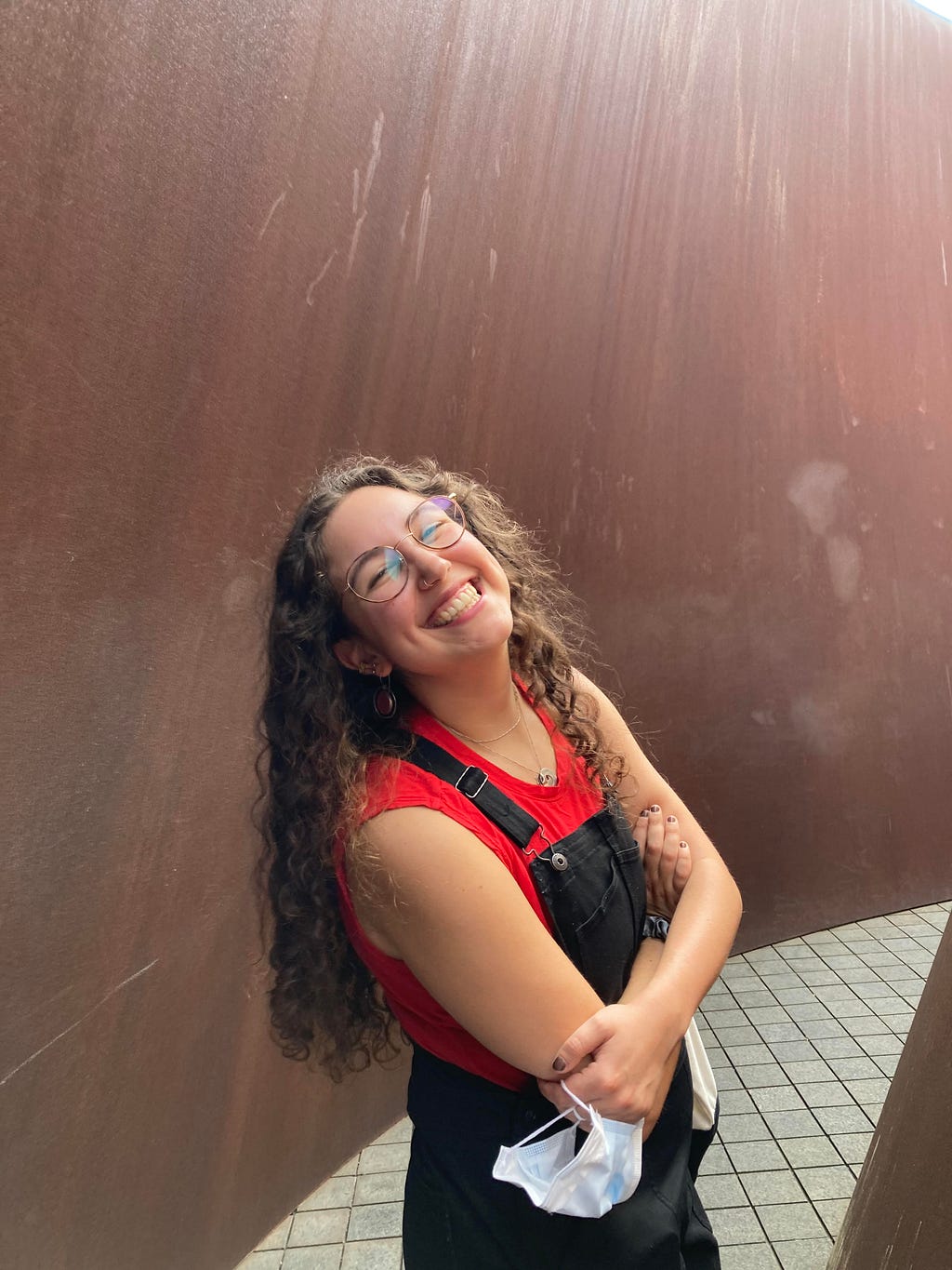 Avital Krifcher standing outside in front of a building