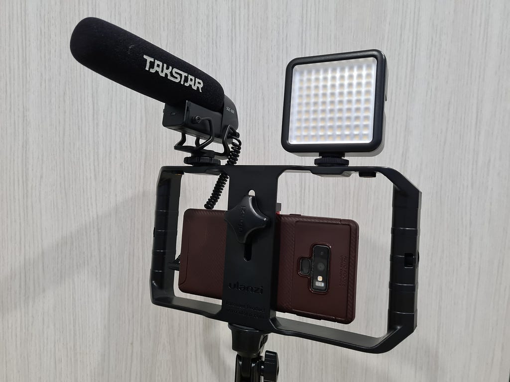 Figure 12. A handheld stabilizer with a mini-LED light and shotgun microphone.