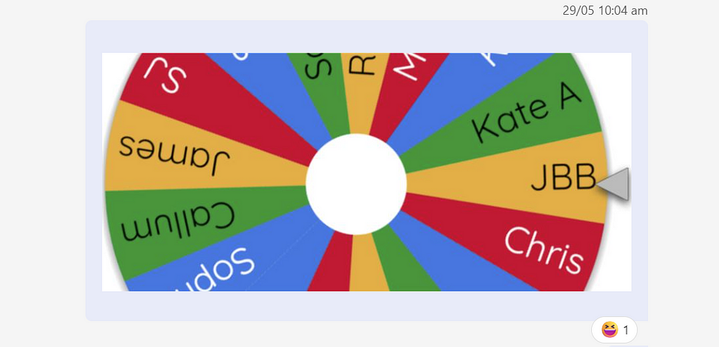 Screenshot showing a spinning wheel from the Team plugin that chooses a team member at random.