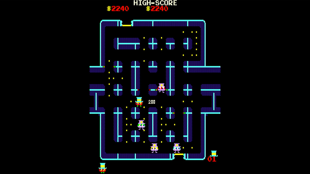 Screenshot of the arcade game Lock ’n’ Chase. The player’s character “Thief”, collects a top hat and is rewarded with 200 points.