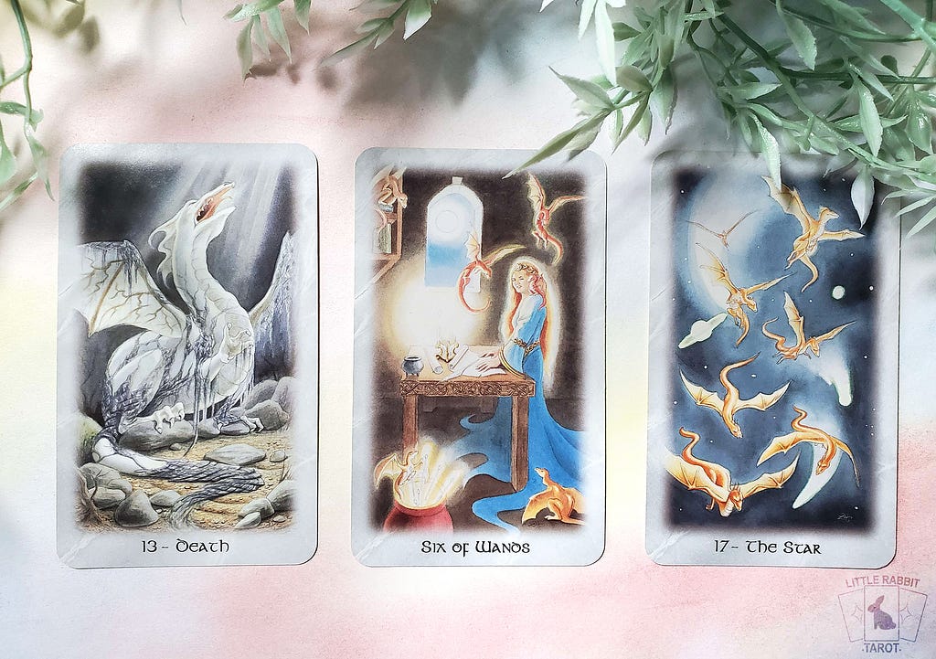 Three tarot card spread of Death, Six of Wands, and The Star, from the deck ‘Celtic Dragon Tarot’.