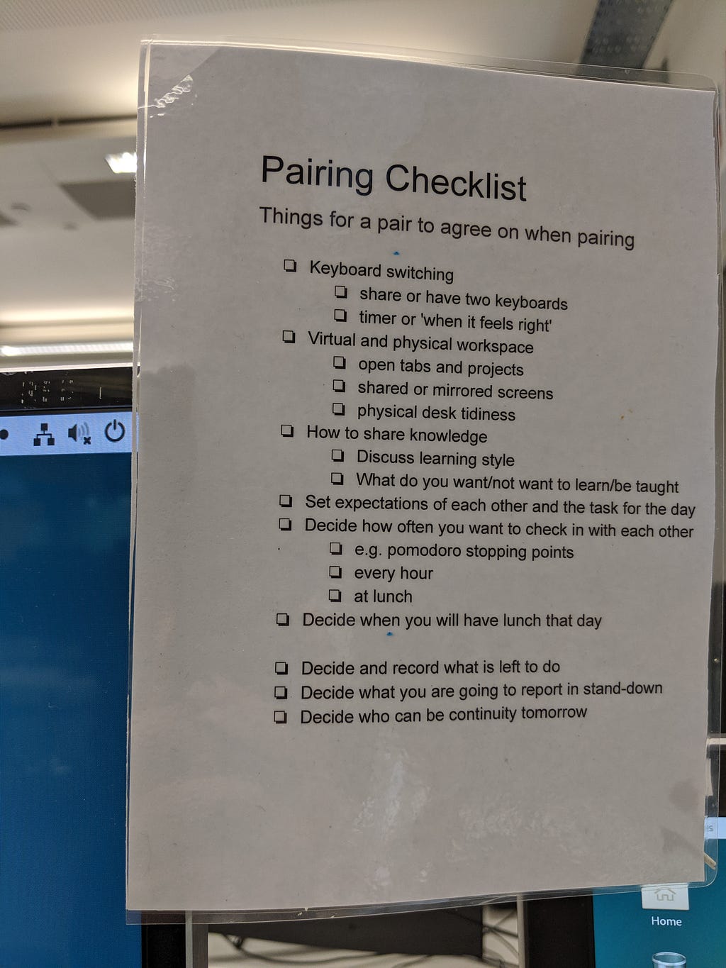 Pairing checklist attached to screen: e.g. Set expectations of each other and the task for the day
