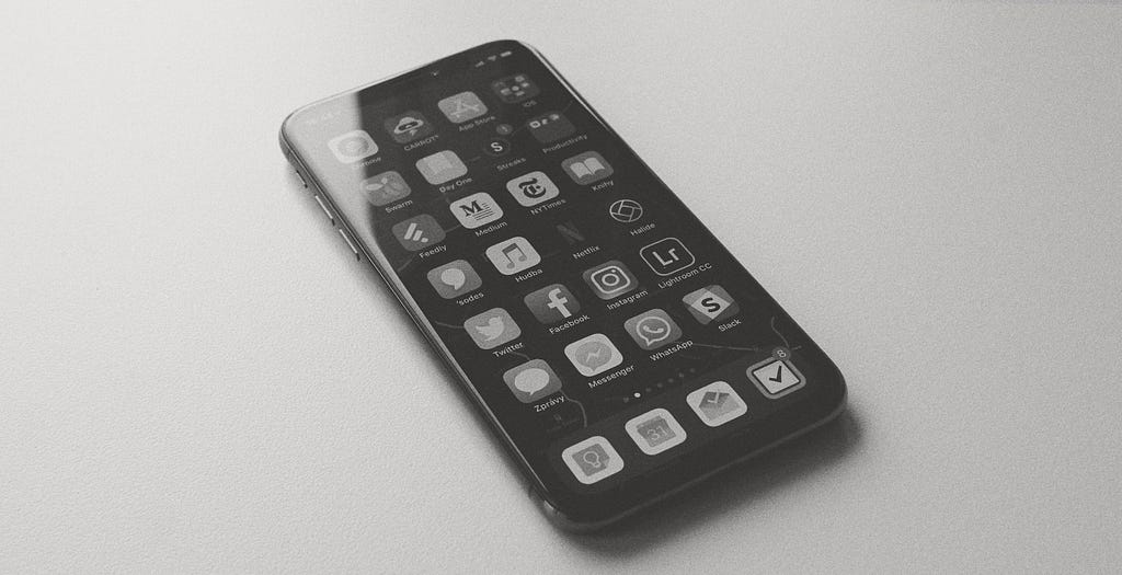 An unlocked smartphone in black and white