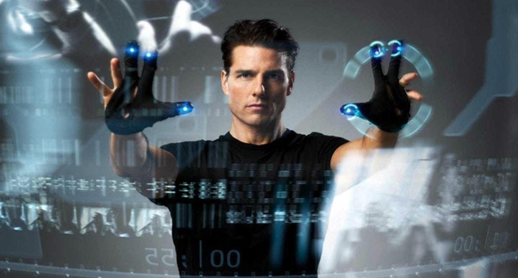 Tom Cruise holding up his arms to interact with the pre-crime scrubber in Minority Report