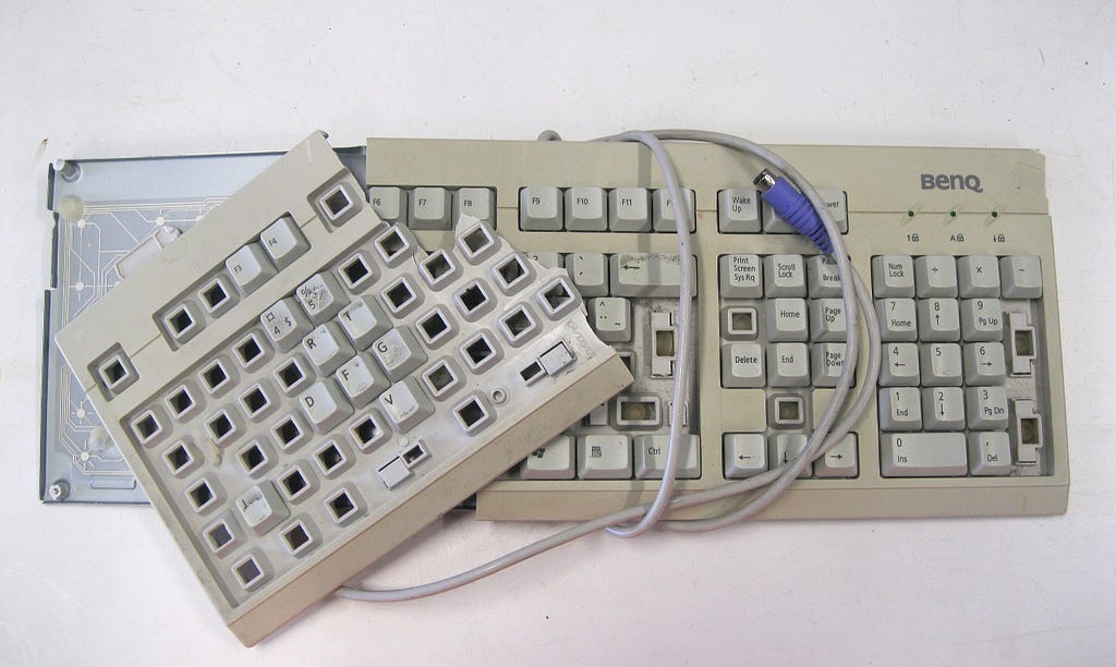 Photograph of a broken BenQ computer keyboard