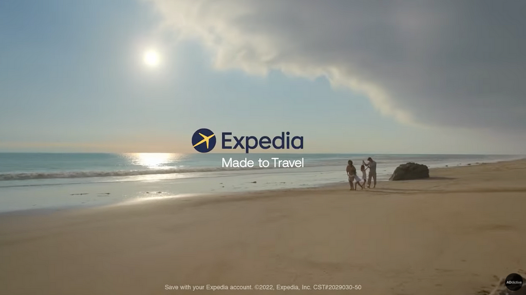 A beach scene with the Expedia logo.