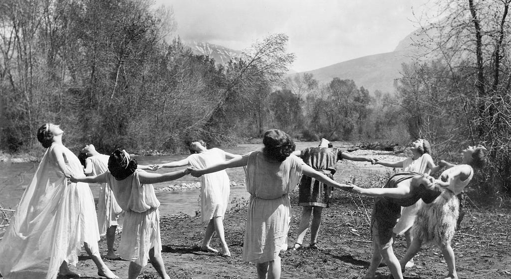 Camp Climaxers singing The Hokey Pokey: “You put your tongue in, you pull your tongue out, you put your tongue in and you eat her kitty out…” Brigham Young University Department of Dance, early twentieth century photo by William J. Done.