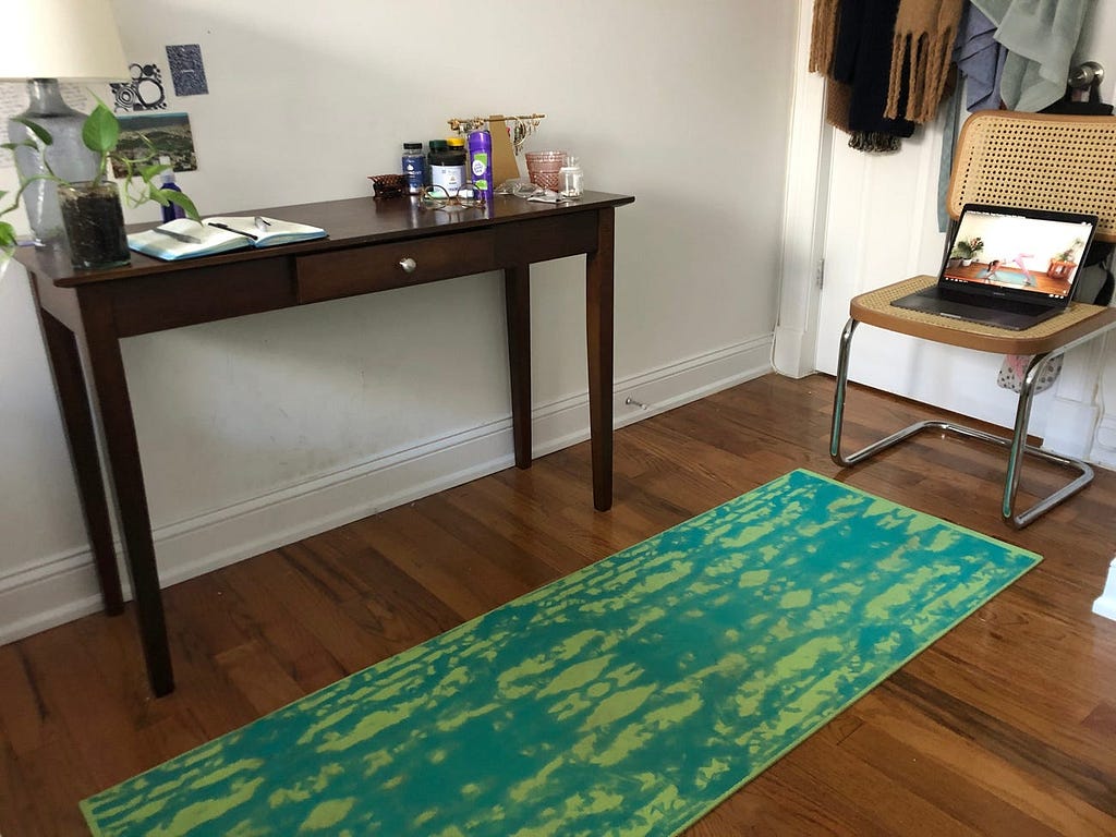 My makeshift yoga studio in my bedroom.