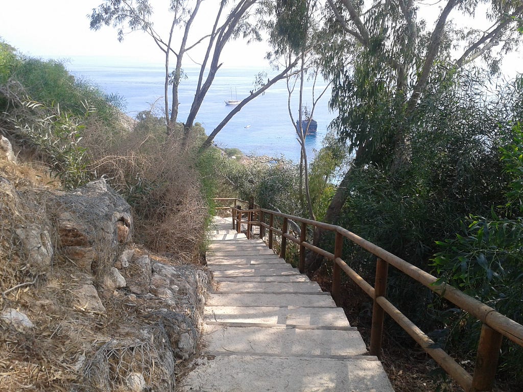 steps leading down to Konnos Bay