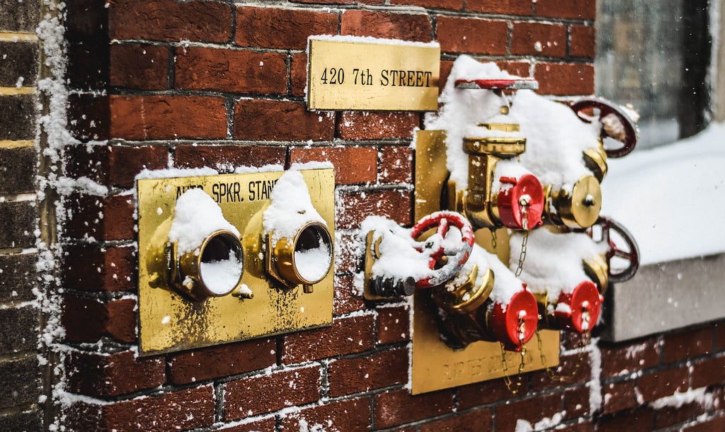 Frozen water pipes are a leading cause of homeowner insurance claims, with approximately one in 60 insured homes submitted a property damage claim. Cleaning up the damage can cost tens of thousands of dollars. Photo by Matt Popovich on Unsplash.