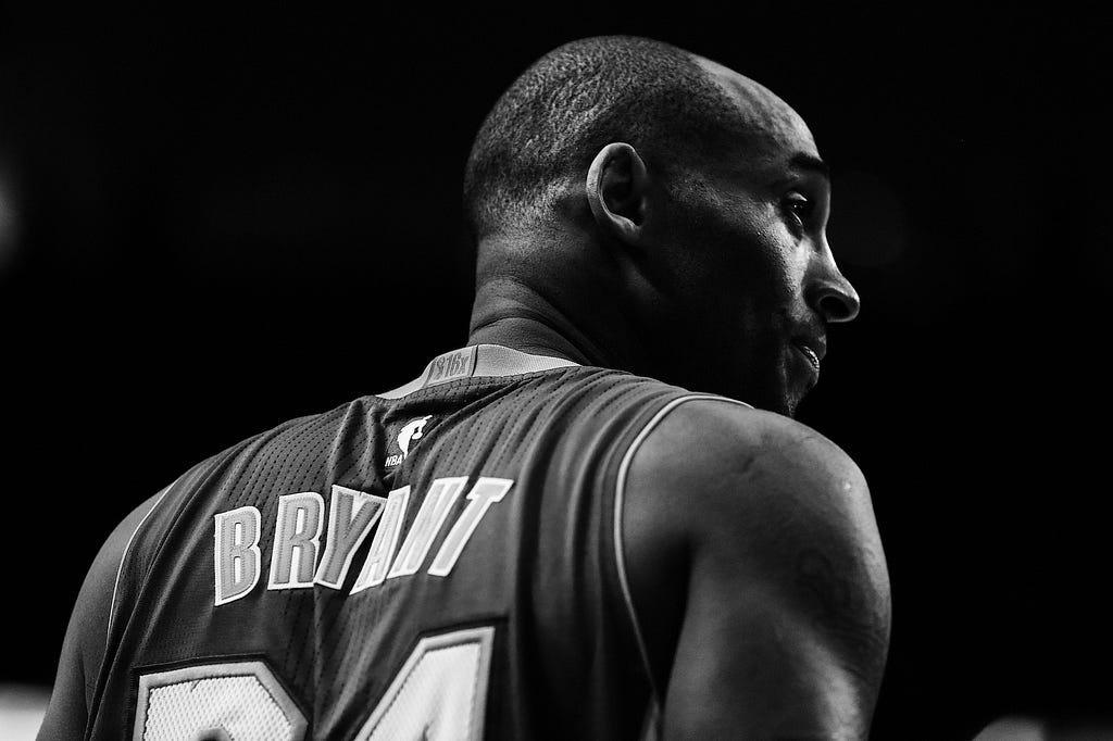 Dramatic Black and white photo of Kobe Bryant’s shoulders