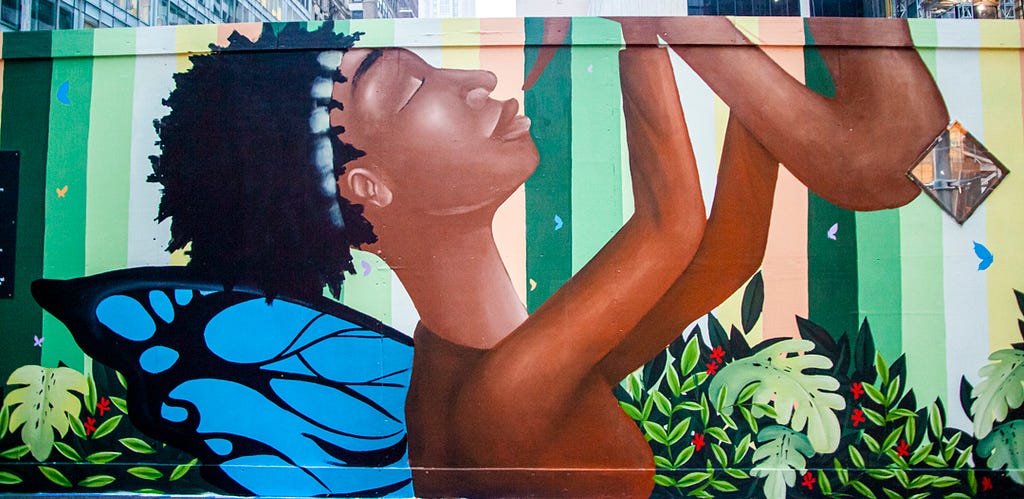 Painted representation of Sandra Bland with her playing the saxophone surrounded by tropical leaves.