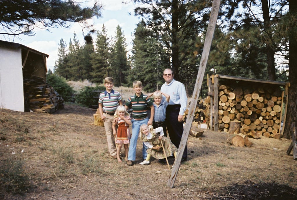 The Openshaw family pose in front of their woodshed in this 1977 image.