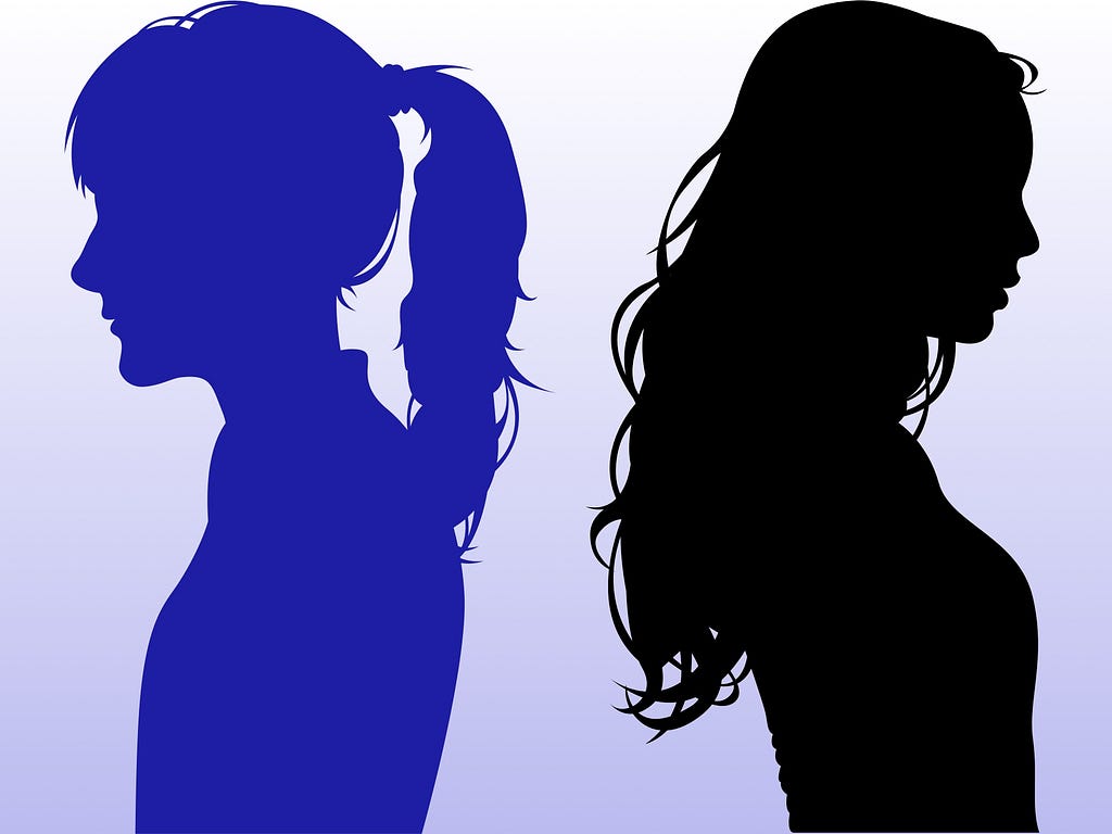 The silhouettes of two women facing away from each other. The girl on the left is blue and the girl on the right is black.