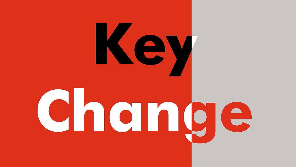 ‘Key Change’ written in bold font on red and grey split background, with colours of the text changing
