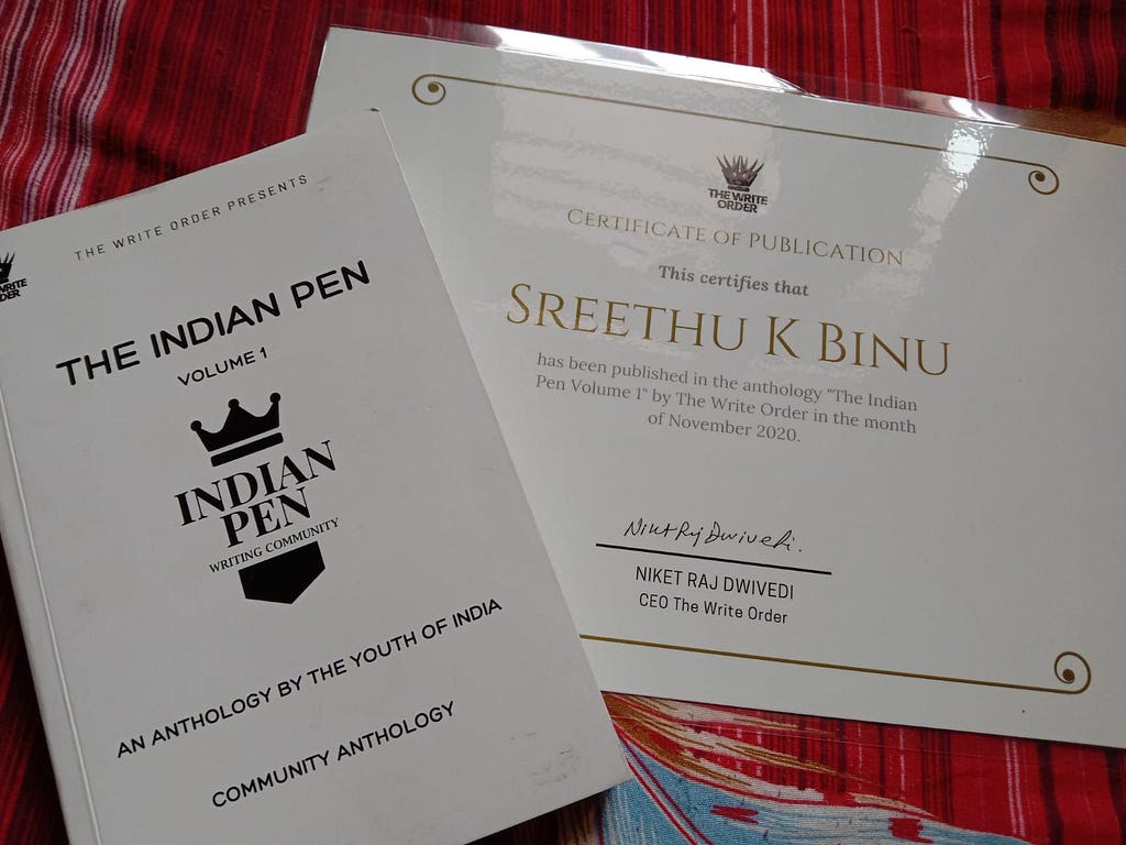 Indian Pen anthology along with publication certificate.