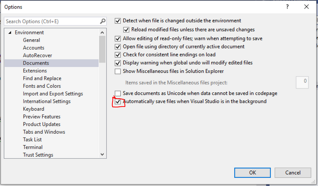 Navigate to Tools -> Options -> Environment -> Documents and check “Automatically save files when Visual Studio is in the background.”
