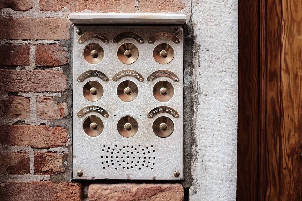 gold-plated doorbell and labels