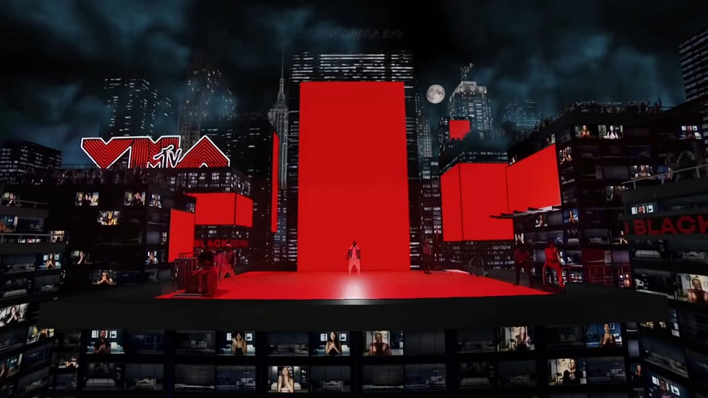 A vast city scape with Black Eyed Peas performing on a virtual stage.