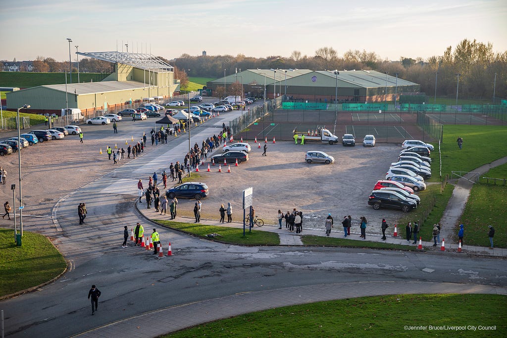 LIVERPOOL, ENGLAND. A view of the queue at the Liverpool Tennis Centre one of the Covid-19 rapid testing sites in Liverpool.