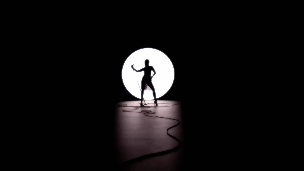 The artist Miley Cyrus standing in sharp relief against a round white back light.