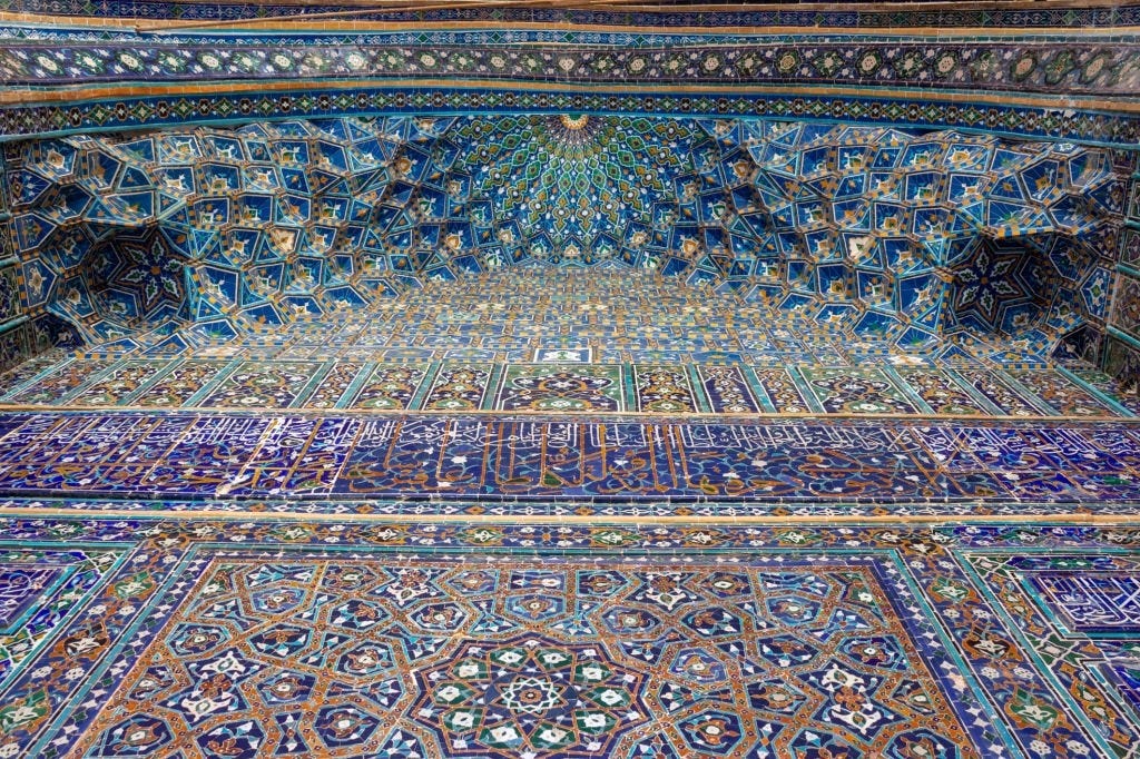 Muqarnas details of Medrese decoration Registan Square Samarkand