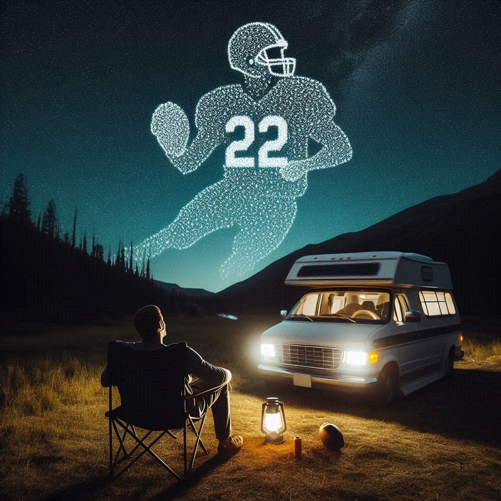a minivan camper, stargazing at a campsite