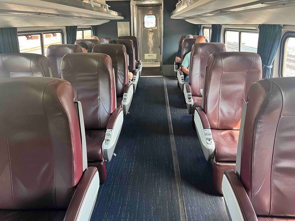 Amtrak Empire Service business class car, showing the 2–1 seat arrangement and what the leather seats look like