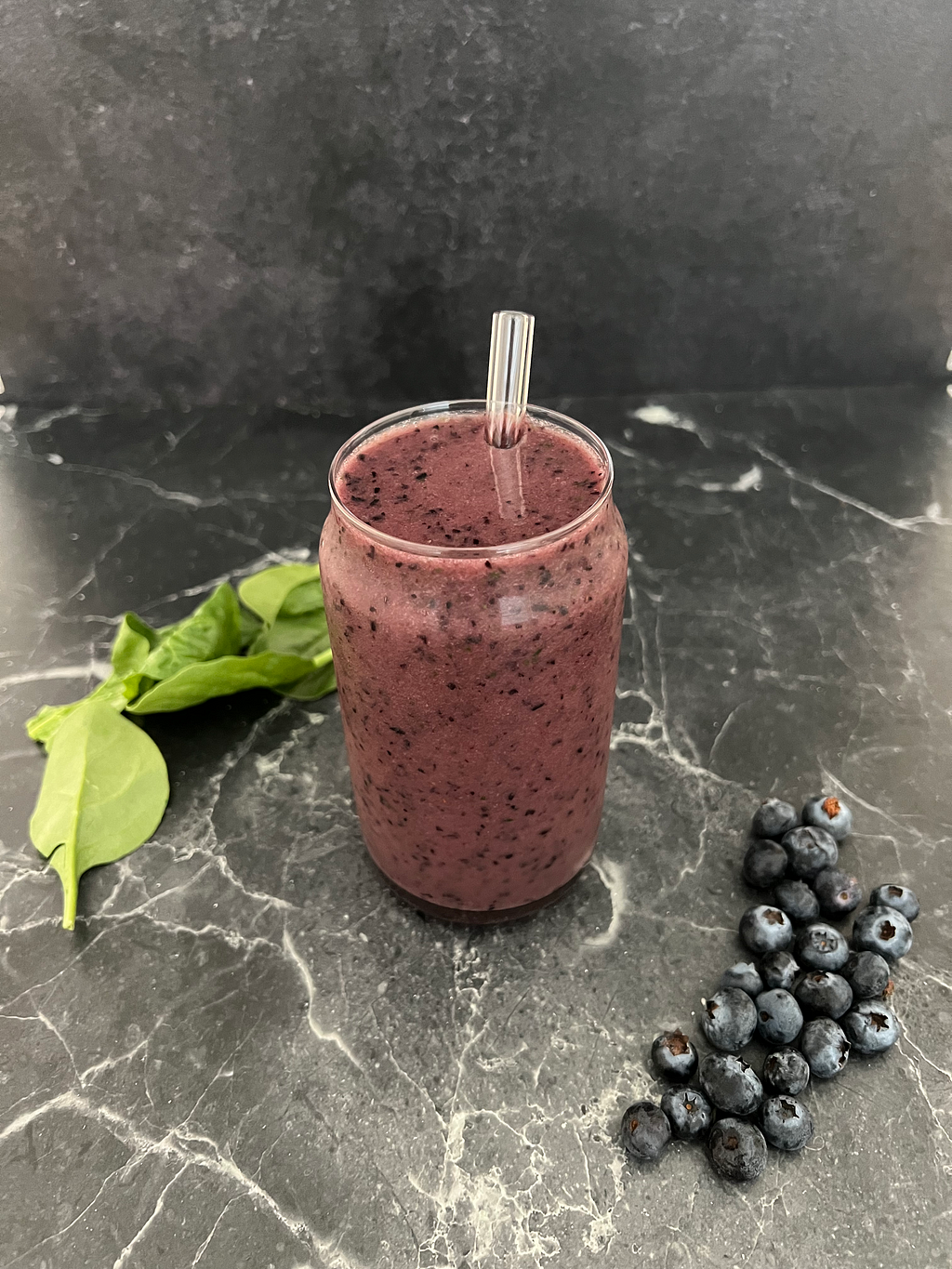 Blueberry smoothie on a marble countertop