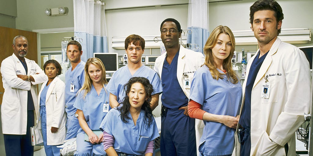 A group of doctors and nurses in scrubs