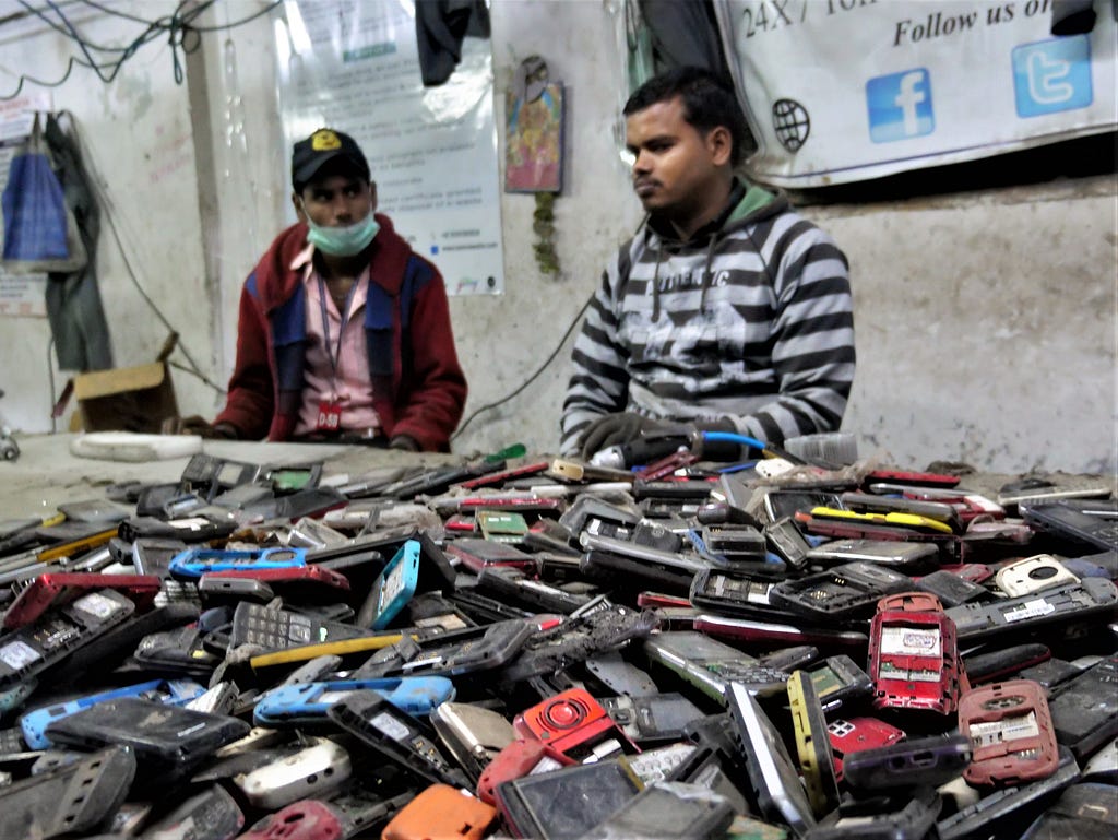 Cell phone recycling at Namo E-waste in Delhi. Credit — Stacey Tenenbaum