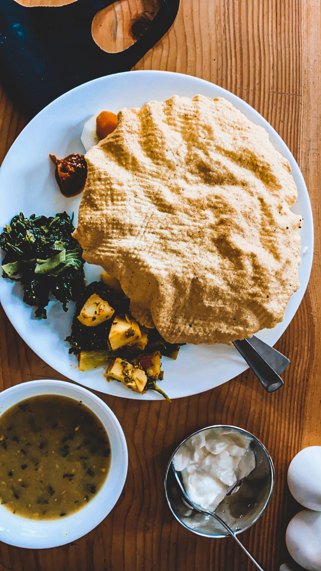 My first dal bhat accompanied by local yogurt- Photo by Author