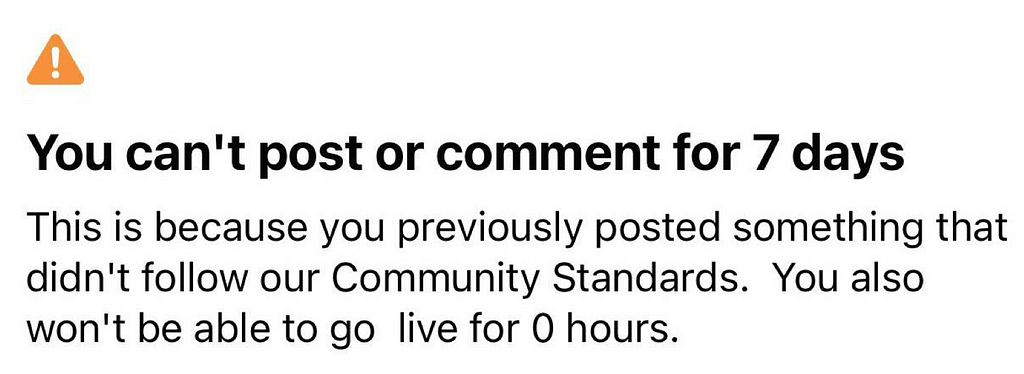 Screenshot of a message from Facebook advising that the user cannot posts because a post was made against Community Standards.