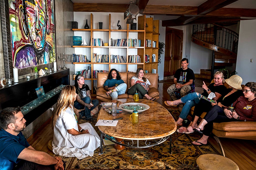 Military veterans and spouses during a group therapy session at a psychedelic retreat in Tijuana, Mexico, March 18, 2022. Photo by Meridith Kohut/New York Times
