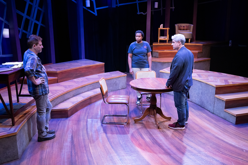 A director talks with two actors on the set of THE WANDERERS