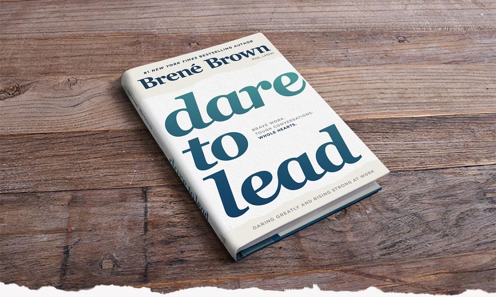 Dare to Lead book on wooden table