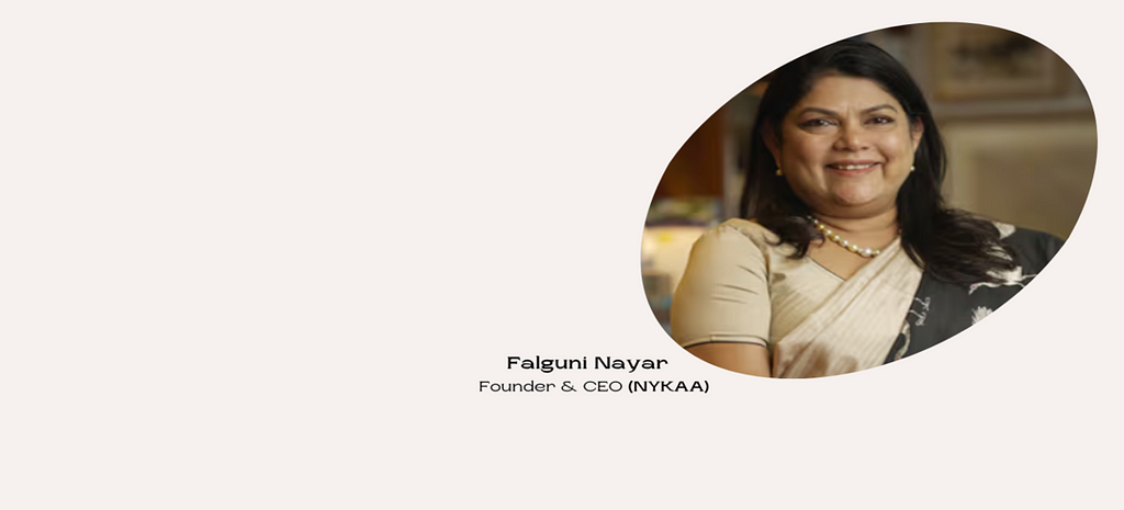 Falguni Nayar, Founder and CEO of Nykaa, smiles warmly in a traditional saree, representing her successful journey in revolutionizing India’s beauty industry.